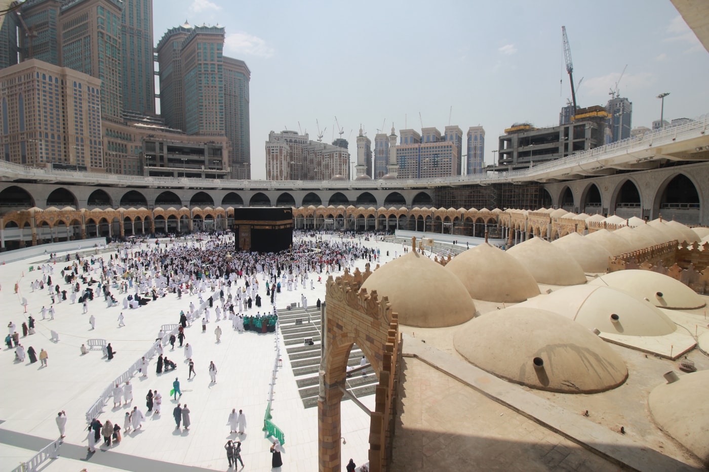 The Masjid al-Haram courtyard and the Holy Kaaba in Makkah